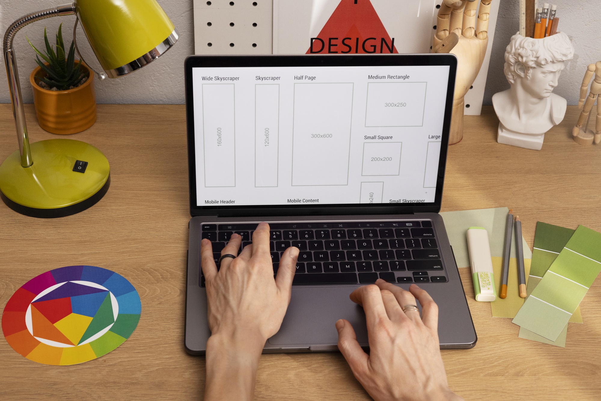 CSV production sheet open on laptop